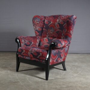 Vintage stoffen oorfauteuil met hocker - bloemenmotief - jaren 70